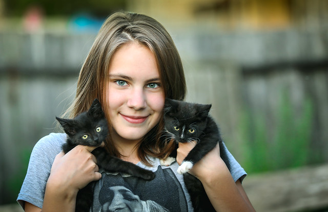 Happy Girl With Kittens courtesy of Svklimkin via Flickr.com
